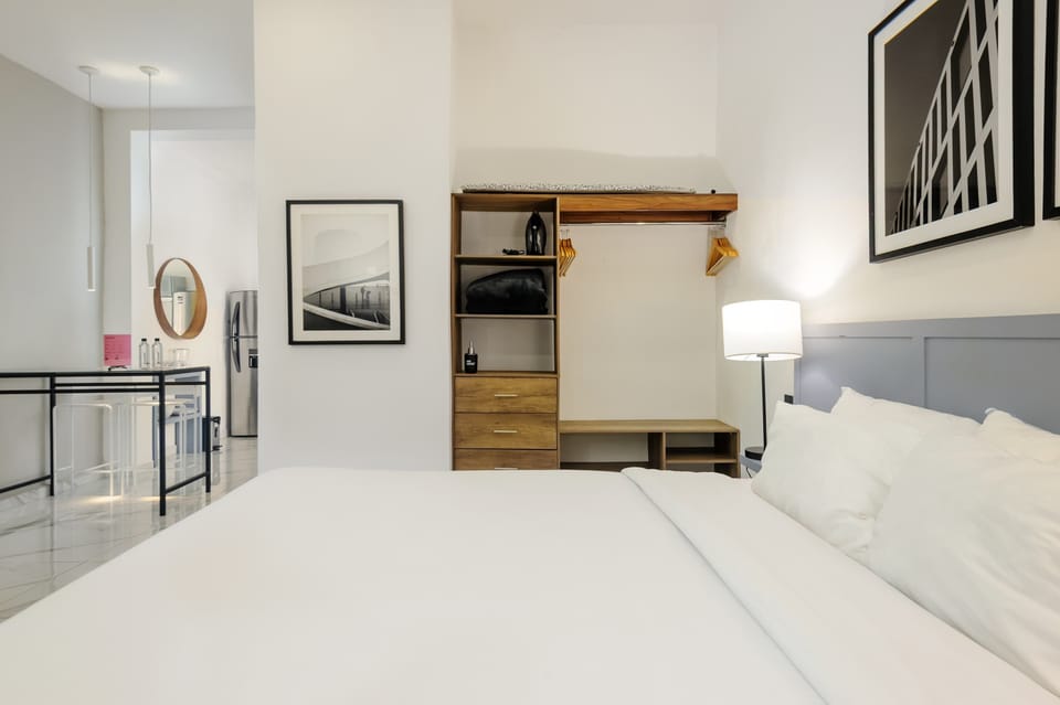 Cozy bedroom corner with warm details and an inviting ambiance.
