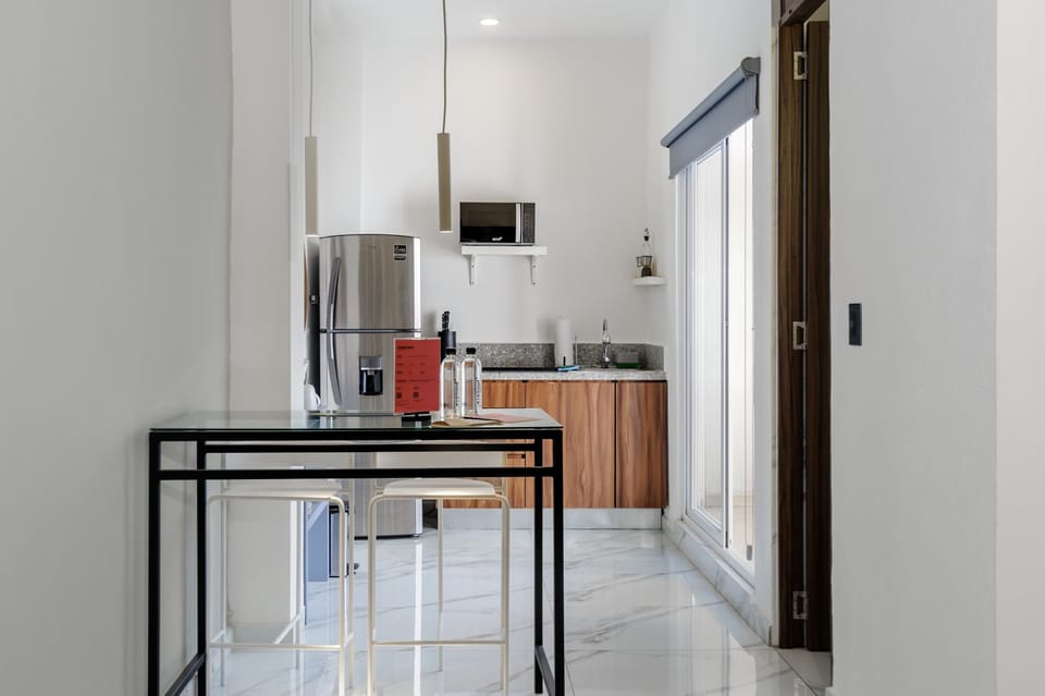 Stylish kitchen entrance with functional spaces and contemporary finishes.
