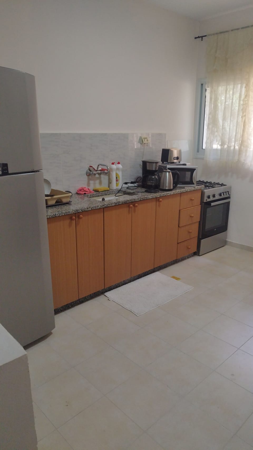 Family Apartment | Private kitchen | Full-size fridge, microwave, oven, stovetop