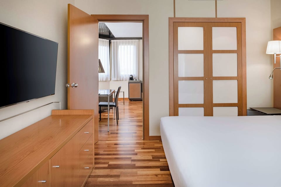 Family Room, 1 King Bed with Sofa bed | Minibar, in-room safe, individually furnished, desk