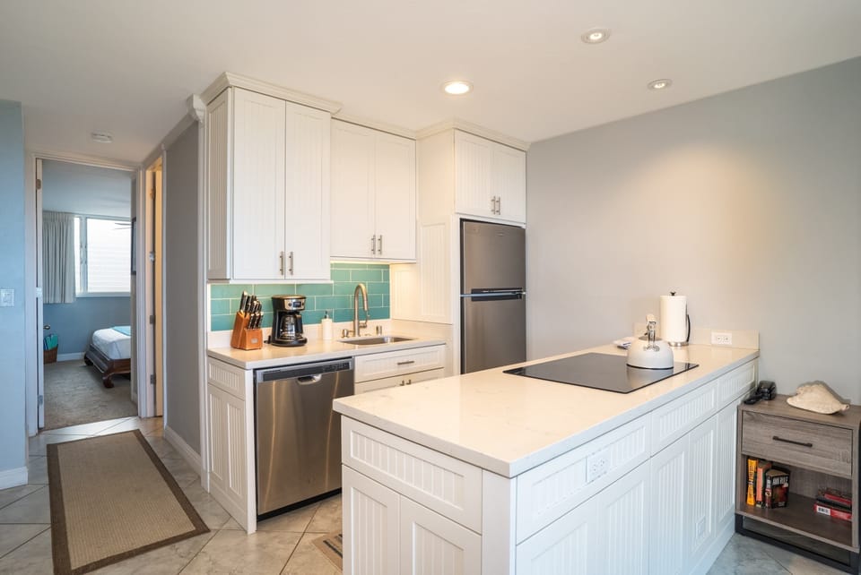Condo, 1 Bedroom | Private kitchen | Coffee/tea maker, fridge, oven, dishwasher