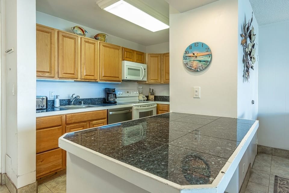 Condo, 2 Bedrooms | Private kitchen | Coffee/tea maker, fridge, oven, dishwasher