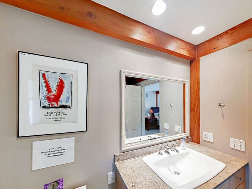 En suite bathroom in primary bedroom.