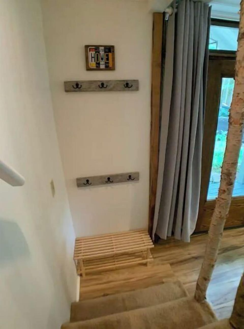 Staircase is located off the kitchen.