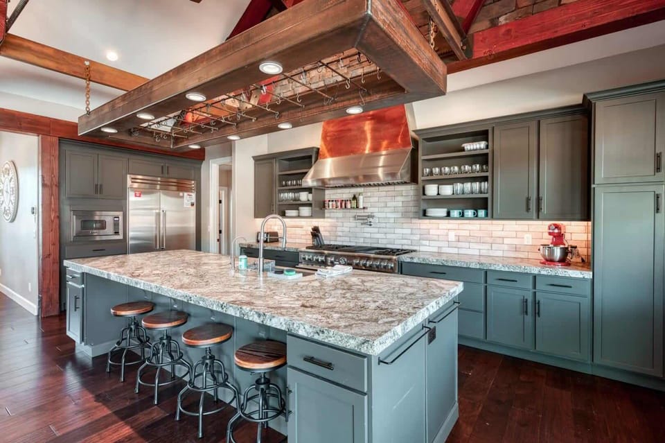 Craft delicious meals in the gourmet kitchen, featuring top-of-the-line appliances and ample prep space.