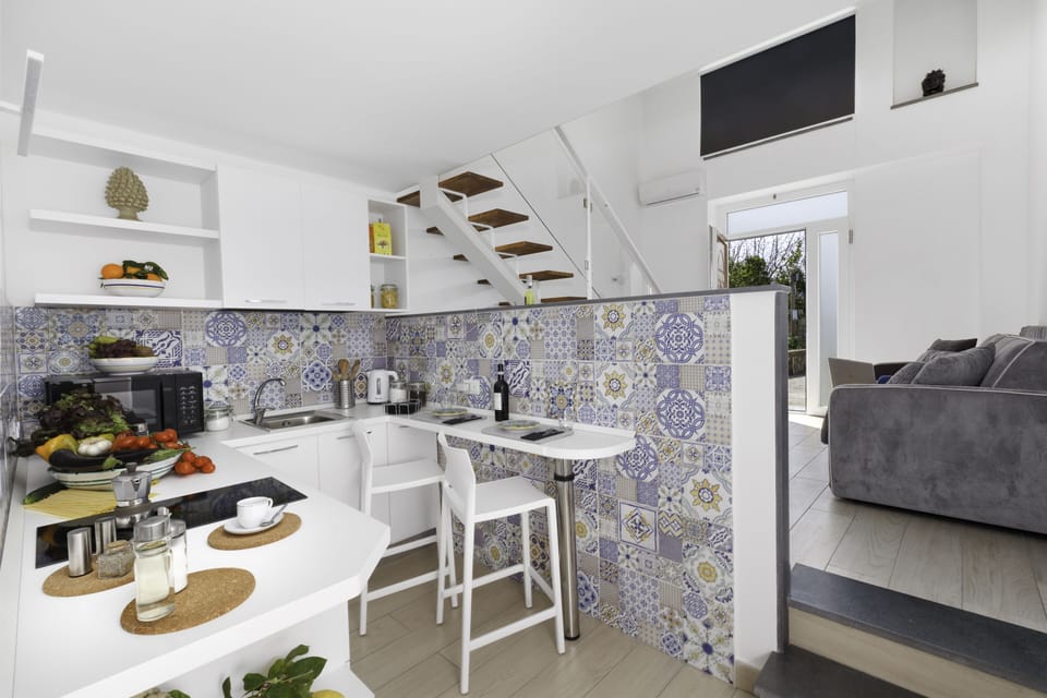 Apartment, Patio | Private kitchen | Coffee/tea maker, electric kettle