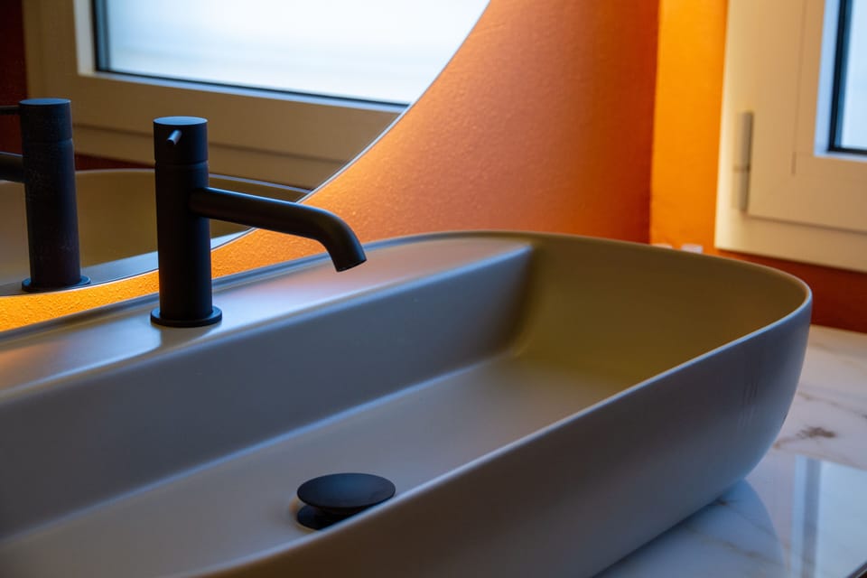 Junior Suite | Bathroom | Shower, rainfall showerhead, hair dryer, bathrobes