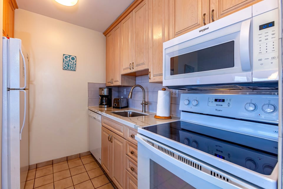 Condo, 2 Bedrooms | Private kitchen | Coffee/tea maker, fridge, oven, toaster