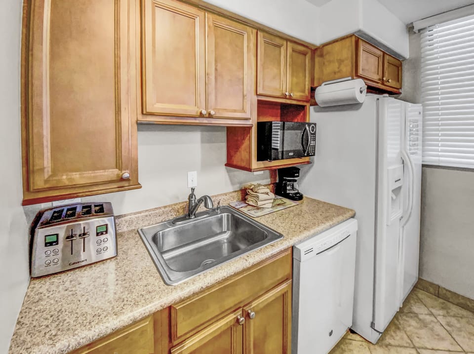Condo, 2 Bedrooms | Private kitchen | Coffee/tea maker, fridge, oven, toaster