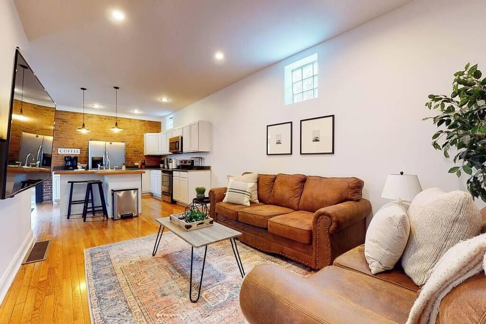 Living Room: Our living area is equipped with a cozy 3-seater couch, a loveseat, two side tables, and a coffee table.