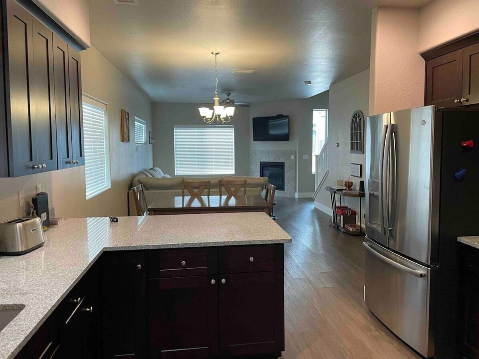 Comfortably make meals in kitchen while still being connected to your family with open floor plan. 