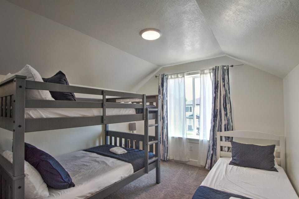 Upstairs Bedroom #5 - Full over Full bunkbed + Twin bed (Northest Bedroom) - this bedroom shares a bathroom with the other bunkroom. Only bedroom without a TV