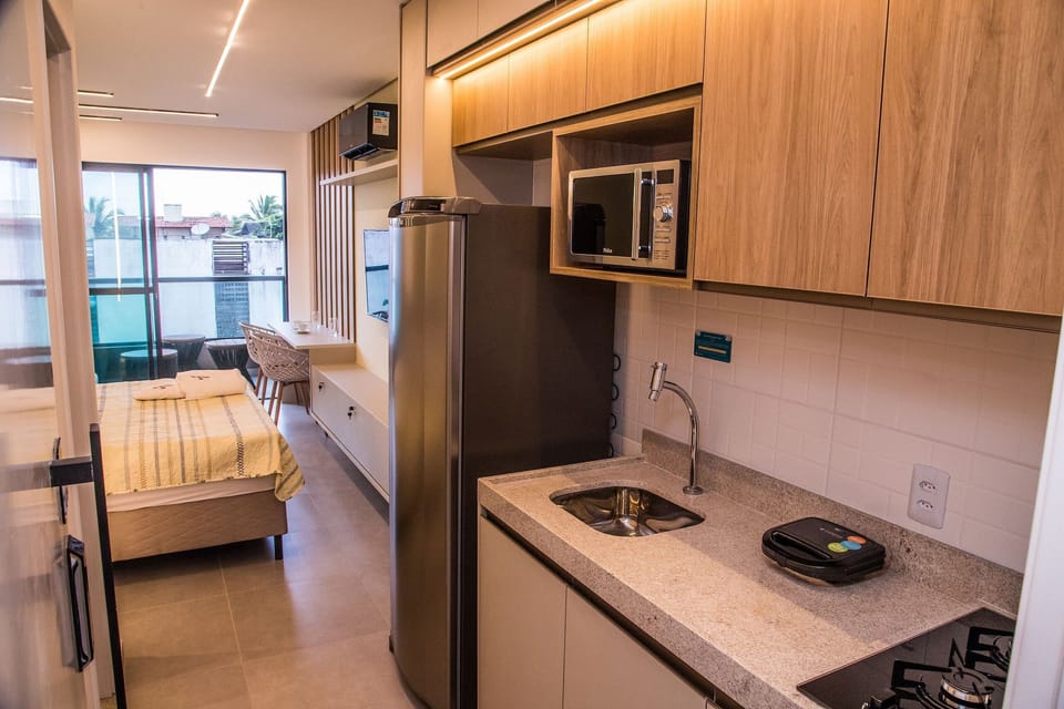 Studio | Private kitchen | Full-size fridge, microwave, stovetop, cookware/dishes/utensils