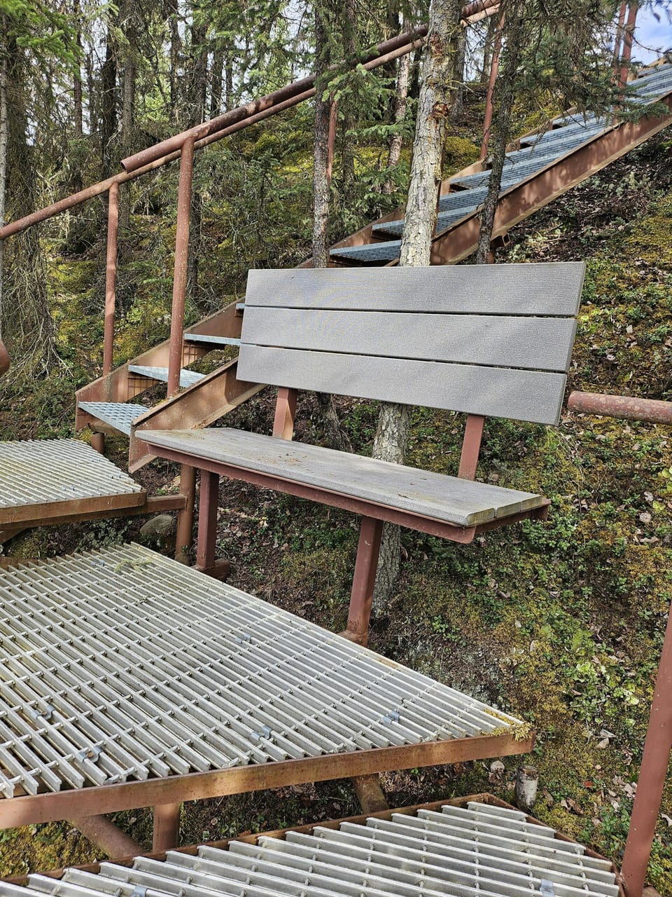 Sitting area on steps down to river