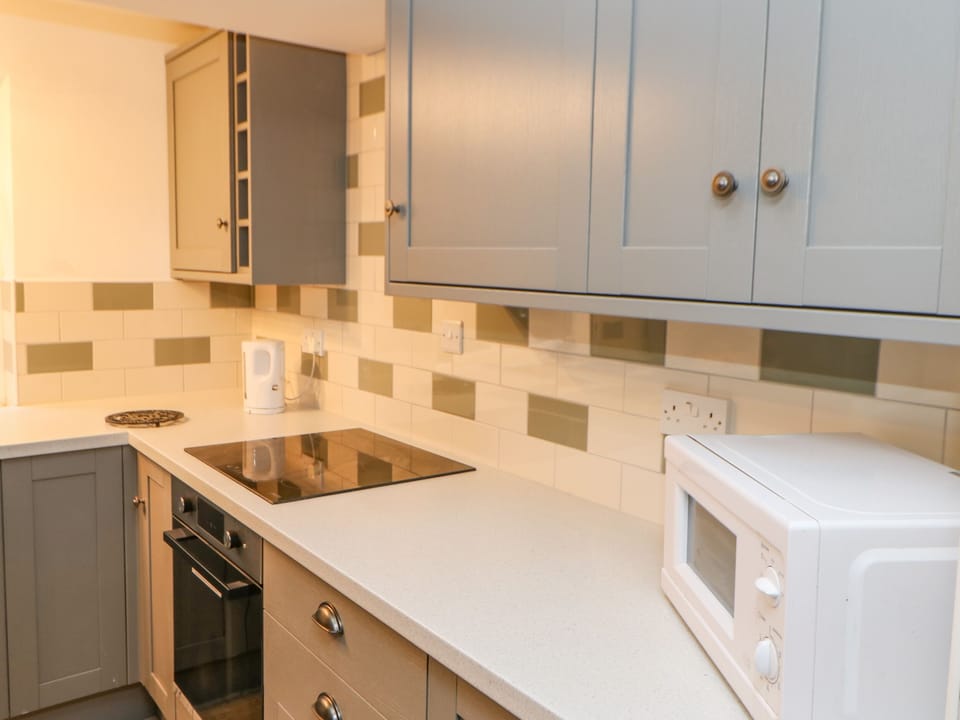 Fridge, electric kettle, toaster, cookware/dishes/utensils