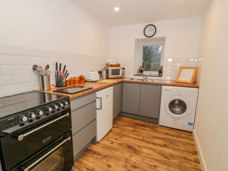 Fridge, electric kettle, toaster, cookware/dishes/utensils