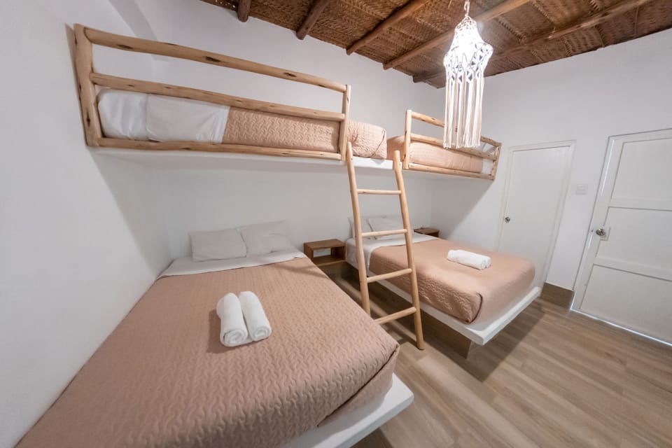Family Room | Premium bedding, minibar, WiFi (free), bed sheets