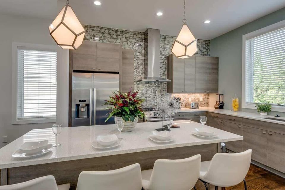 Large kitchen island with seating for 4! Lots of natural. light.  