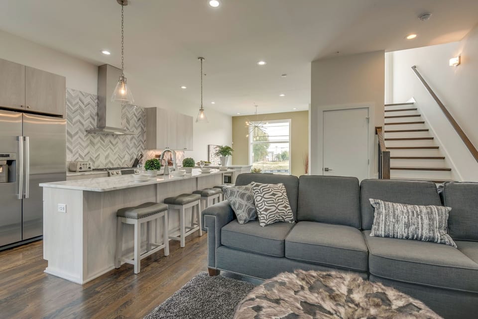 Chef's kitchen overlooks the living room seating area - great for big groups. 