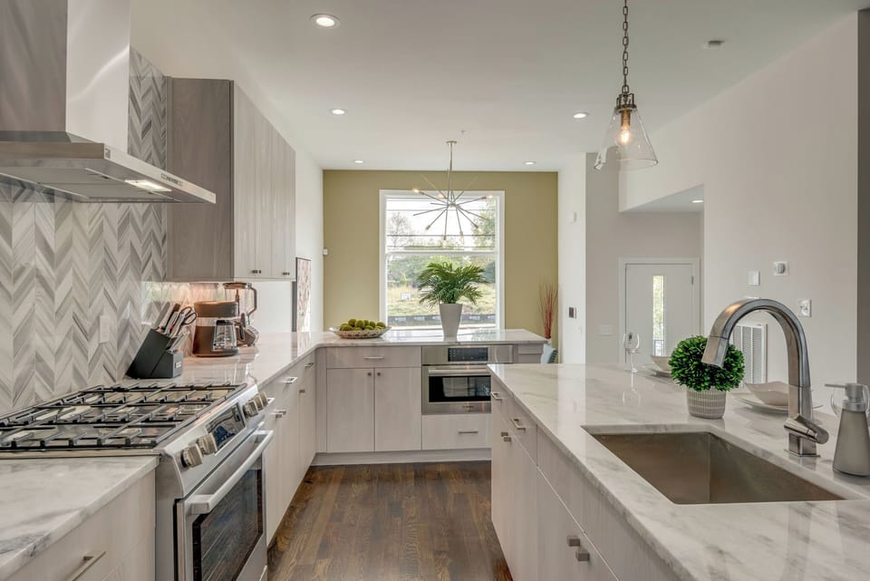 Fully equipped chef's kitchen featuring a large island - perfect for families.  