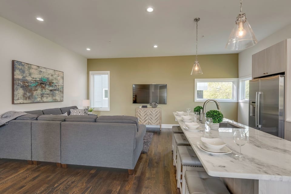 Chef's kitchen overlooks the living room seating area - great for big groups. 
