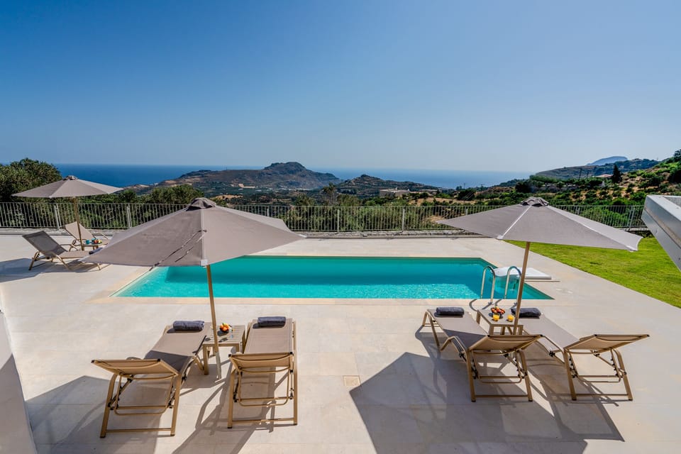 Spacious pool area with sea view