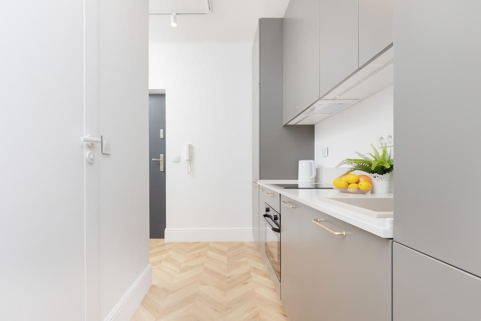 Another perspective of the kitchen, emphasizing the functional and stylish design.

