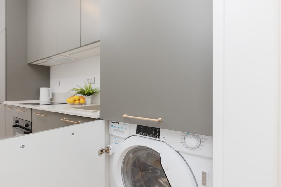 Another perspective of the kitchen, emphasizing the functional and stylish design.

