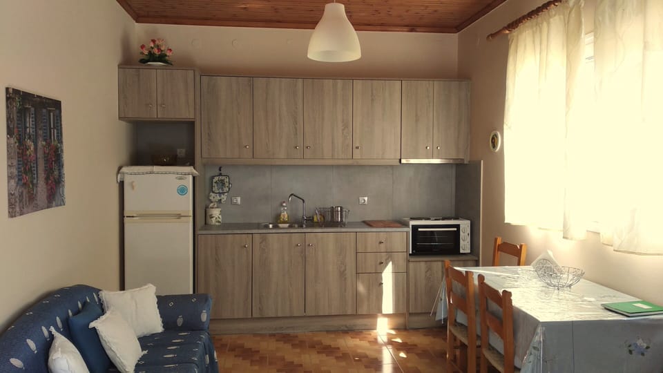 Christina Villa 2 - Kitchen fully equipped with living room.