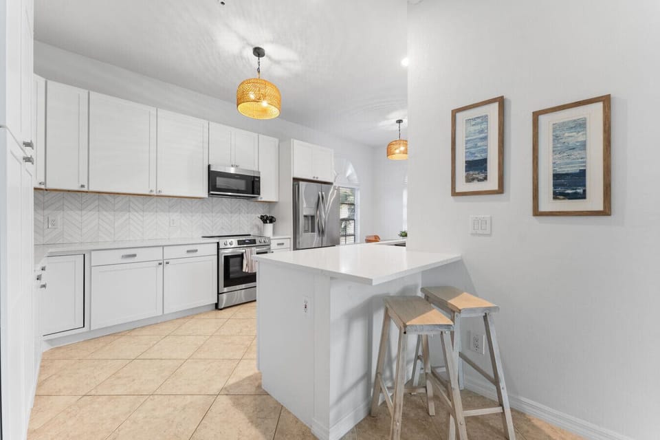 Cook together in this bright, stylish kitchen—perfect for group meals