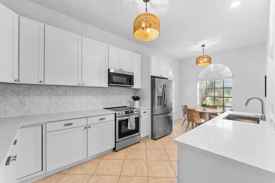 Cook together in this bright, stylish kitchen—perfect for group meals