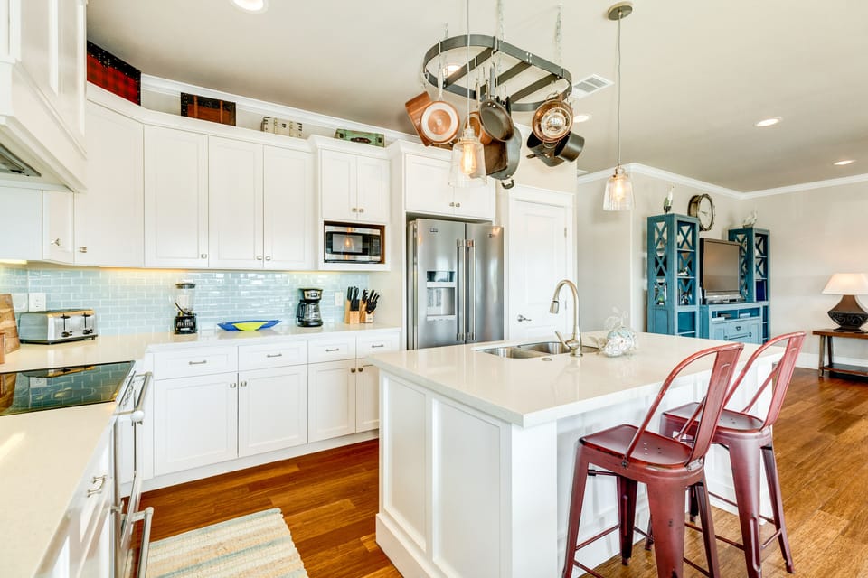 Large kitchen island offers plenty of prep and serving space