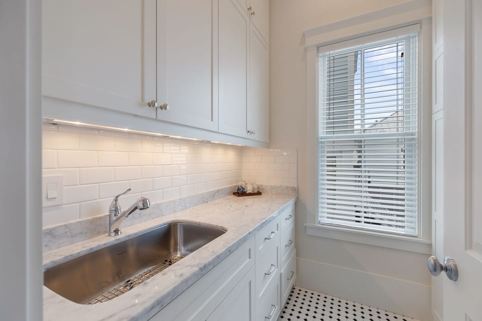 Laundry Room (full-size washer and dryer not shown)