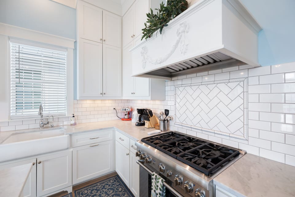 Large gas range is perfect for preparing meals.