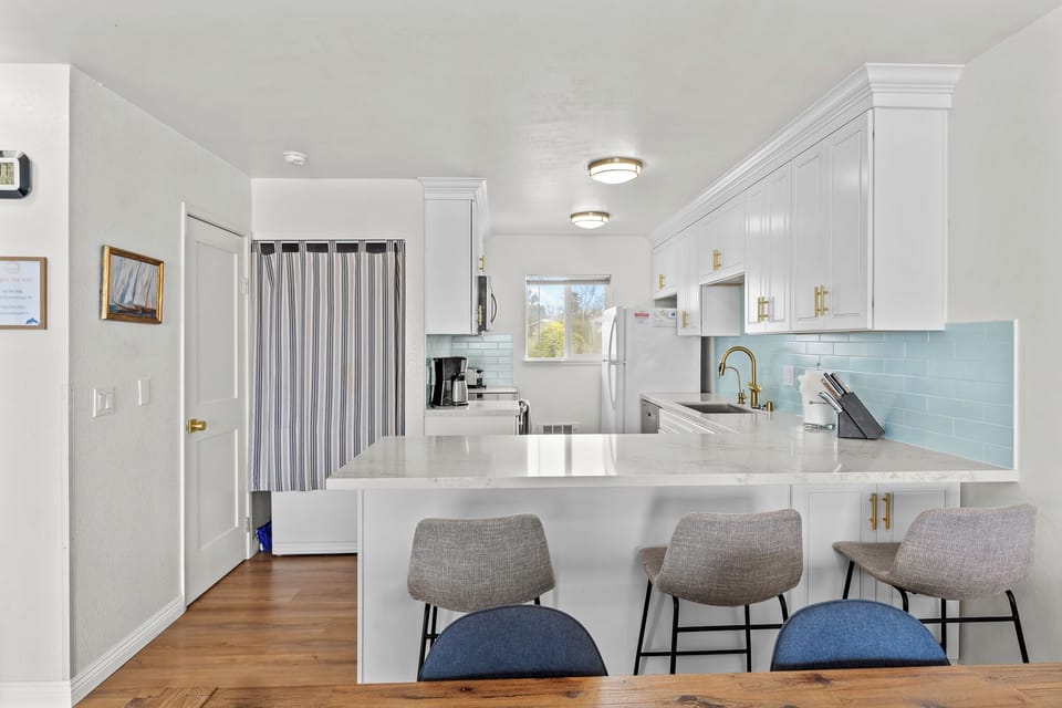 Dining table and bar seating area.