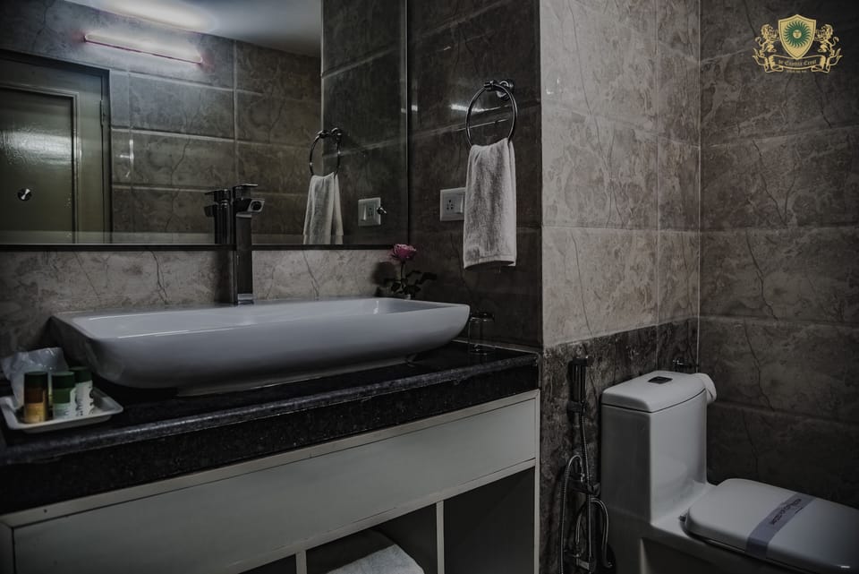 Shower, rainfall showerhead, soap, shampoo