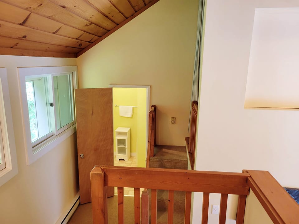 Steps from queen to bunks and bath