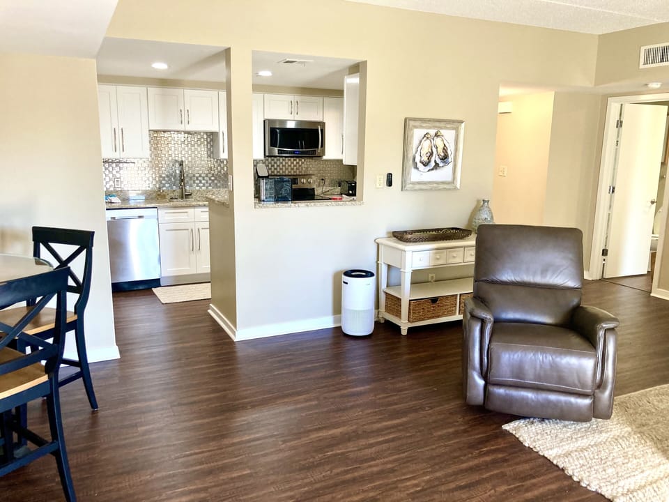 Open concept layout allows conversations from the kitchen to the den.