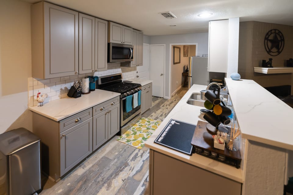 Get cooking with fully stocked kitchen and large gas range ready to go! 