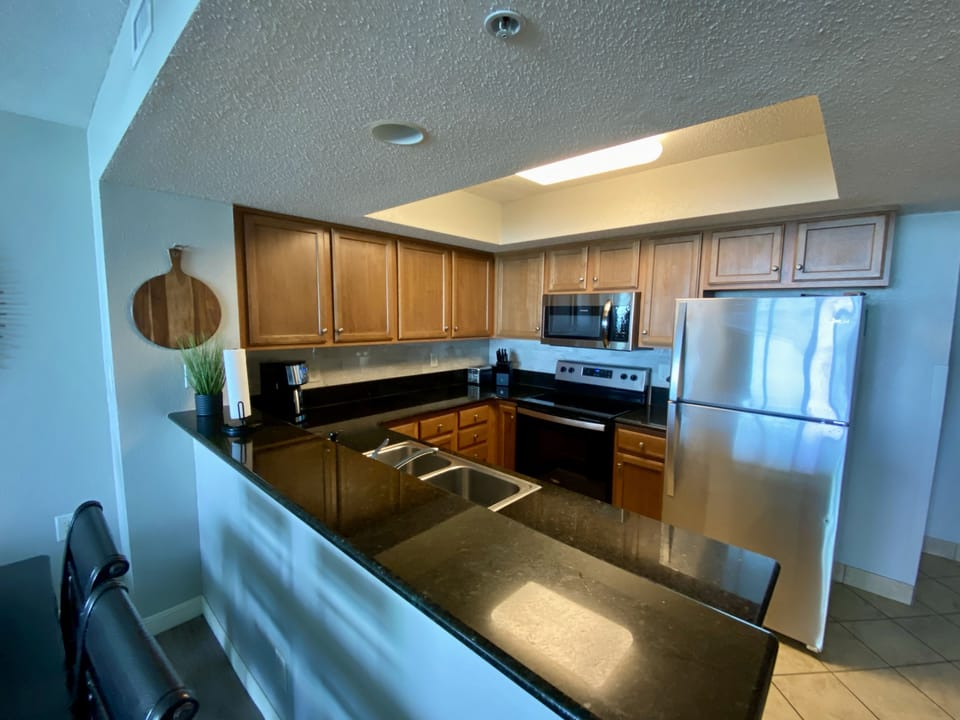 Fully stocked kitchen with spices, dishware, utensils, coffee maker, etc.!
