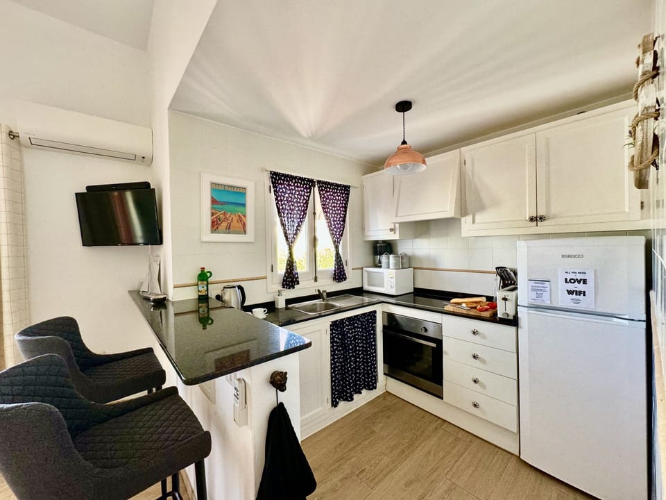 Kitchen with bar stools