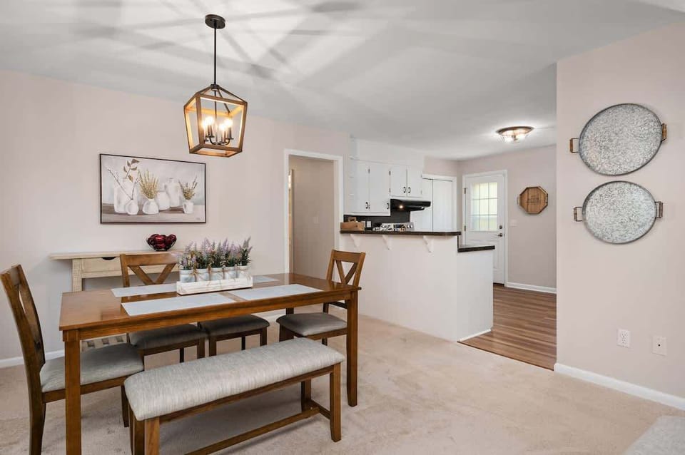 The dining room is right off the kitchen, so the cook can be part of the fun! The kitchen is fully stocked with all the essentials you need to make any meal.