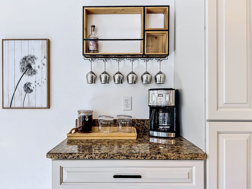 Wake up each morning to a fresh cup of coffee - we have a drip coffee maker, along with complimentary ground coffee and sugar.