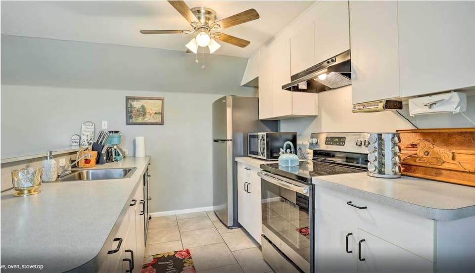Kitchen with stainless steel appliances and basic kitchen necessities available