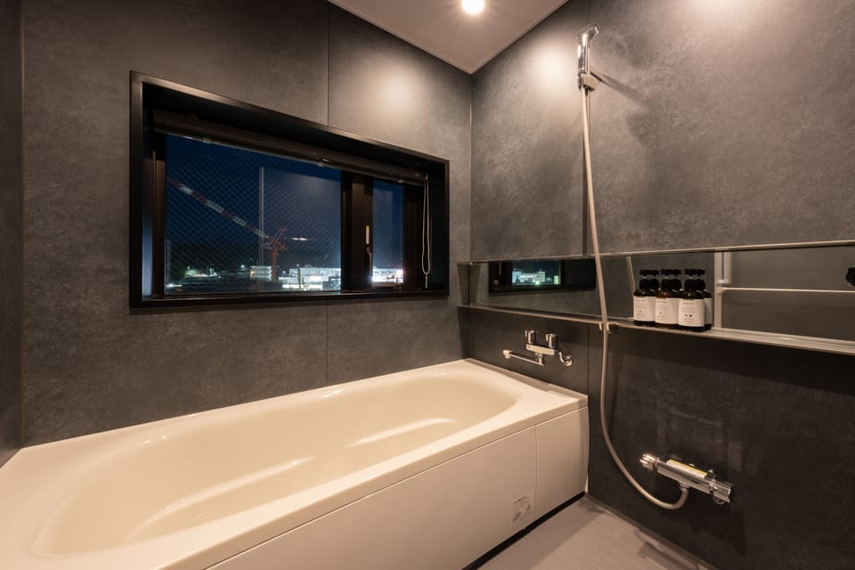 Twin Room, Non Smoking (with Terrace) | Bathroom | Hair dryer, slippers, electronic bidet, towels