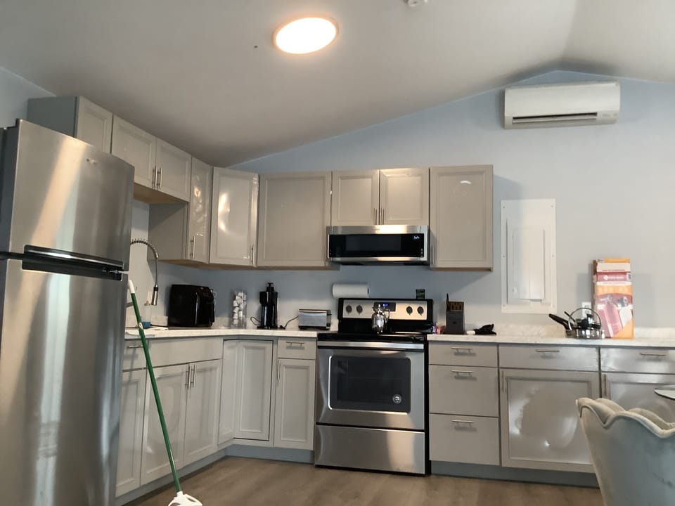 Full kitchen with essential cookware 