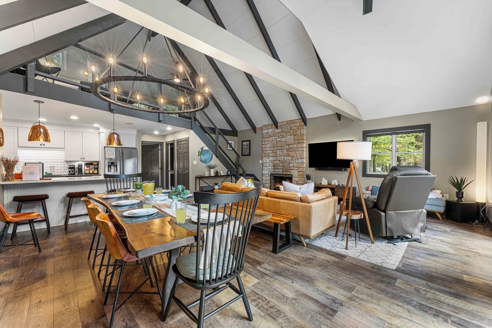 Stylish dining area flows seamlessly into the kitchen and living room, perfect for gatherings.
