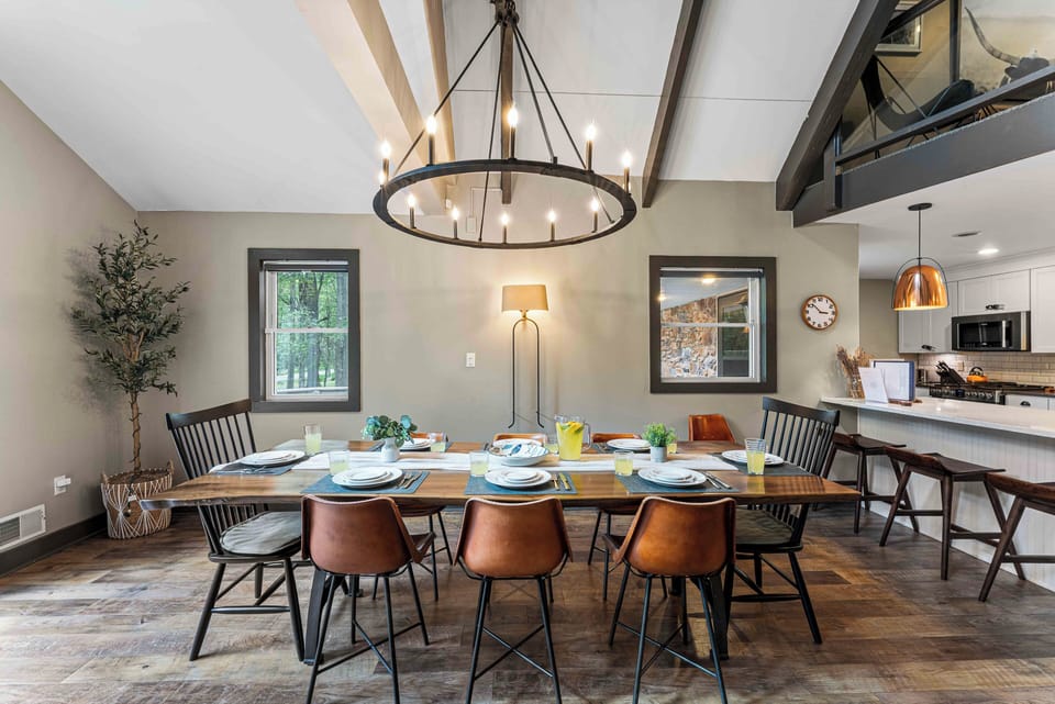 Dining table seats eight comfortably, making it ideal for family meals and group gatherings.