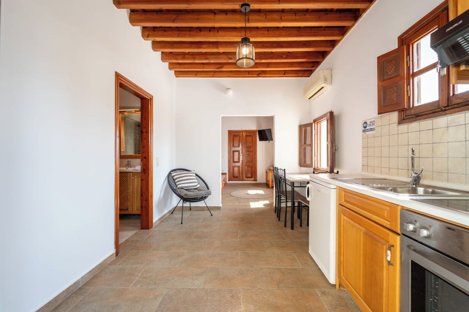 Traditional Suite with Terrace and Sea View | In-room safe, laptop workspace, blackout drapes, iron/ironing board