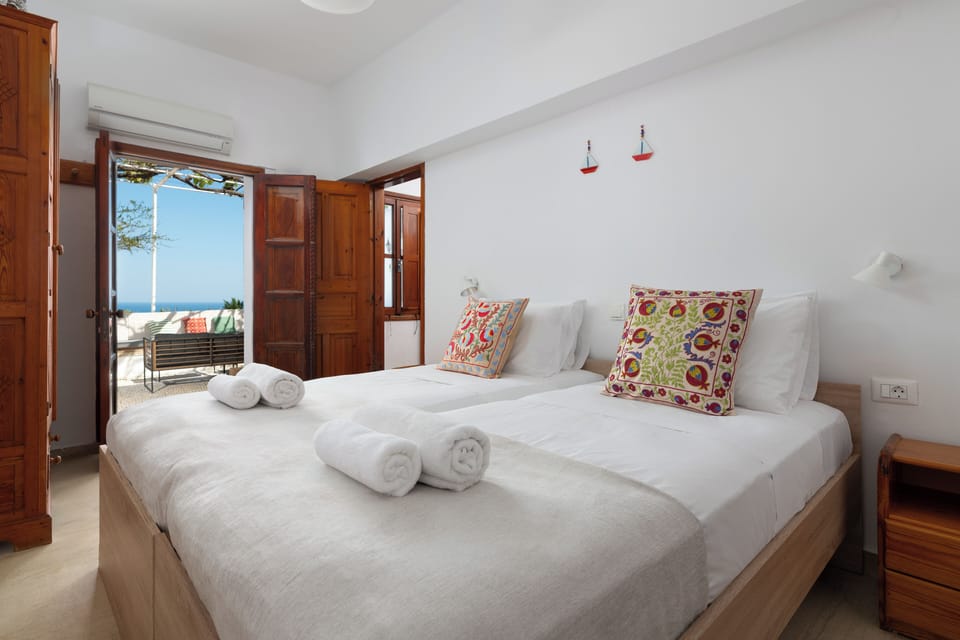 Four Bedroom Villa with Sea View | In-room safe, laptop workspace, blackout drapes, iron/ironing board